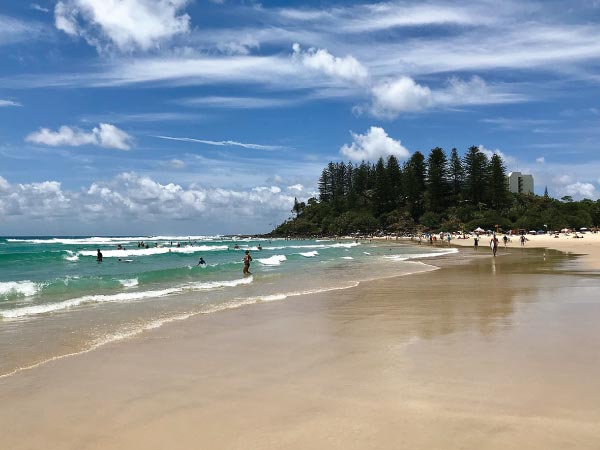 Body of water, Beach, Sky, Sea, Coast, Shore, Ocean, Water, Cloud, Daytime, Coastal and oceanic landforms, Wave, Sand, Tree, Vacation, Bay, Wind wave, Tropics, Caribbean, Summer, Beach, Greenmount Beach, Rainbow Bay, Coolangatta, Coolangatta Beach, Kirra, Nobby Beach
