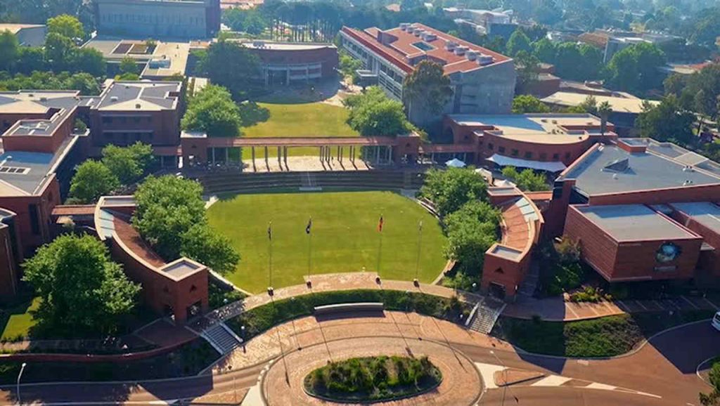 Residential area, Bird's-eye view, Building, Property, Architecture, Urban design, Aerial photography, Public space, Landscape, Estate, City, Suburb, Mixed-use, Campus, Roof, Metropolitan area, Town square, Curtin University, The Australian National University