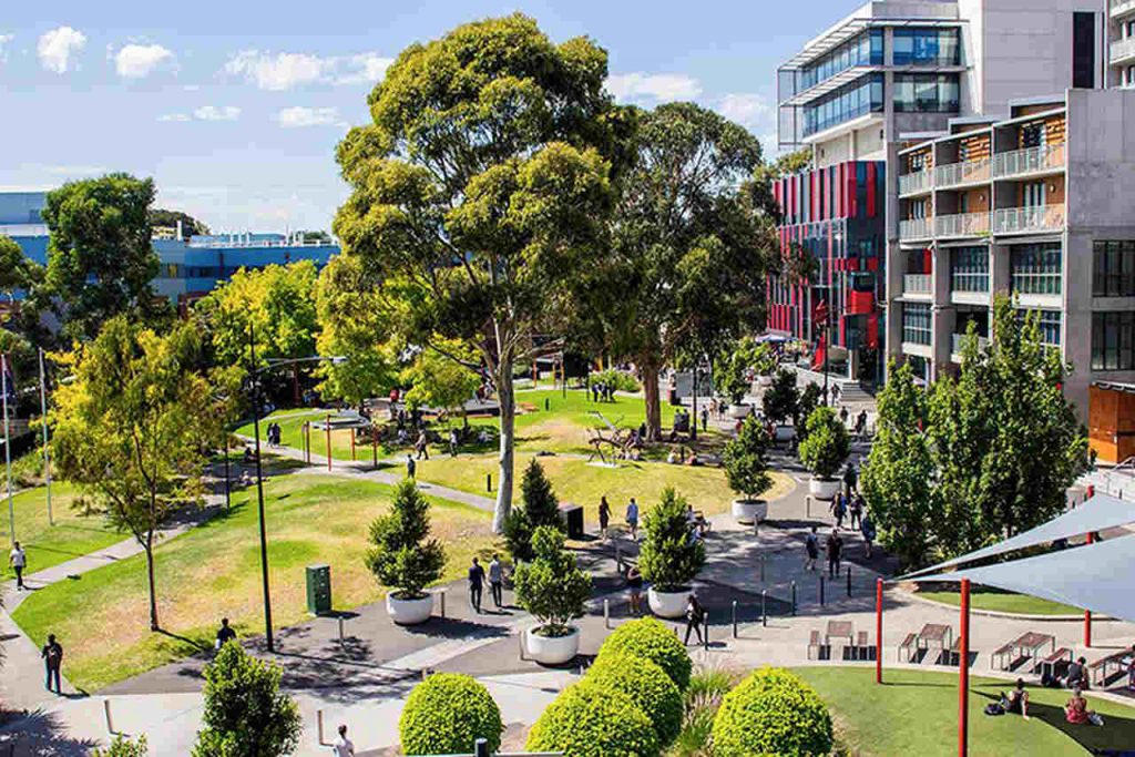 Residential area, Public space, Mixed-use, Metropolitan area, Property, Urban design, City, Daytime, Urban area, Building, Human settlement, Architecture, Neighbourhood, Tree, Town, Town square, Real estate, Plaza, Condominium, Landscape, Swinburne University of Technology, University of Oxford, University, International student, Student, School, Scholarship, Swinburne University of Technology, College