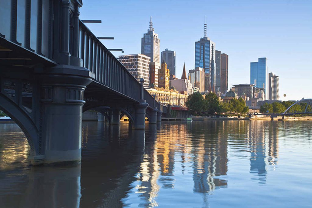 Reflection, City, Cityscape, Metropolitan area, Skyline, Urban area, Water, Metropolis, Skyscraper, Landmark, Human settlement, Daytime, River, Downtown, Sky, Waterway, Architecture, Tower block, Morning, Bridge