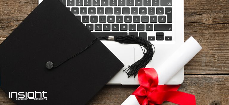 Black, Computer keyboard, Technology, Electronic device, Desk, Headgear, Input device, Computer, Fashion accessory, Academic degree, Diploma, Postgraduate diploma, Graduation ceremony, Higher Education