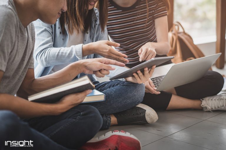 Arm, Sitting, Hand, Denim, Interaction, Sharing, Comfort, Thigh, Reading, Learning, Nail, Computer, Lap, Education, Student, Gadget, Personal computer, Collaboration, Student, Study skills, Education, Classroom